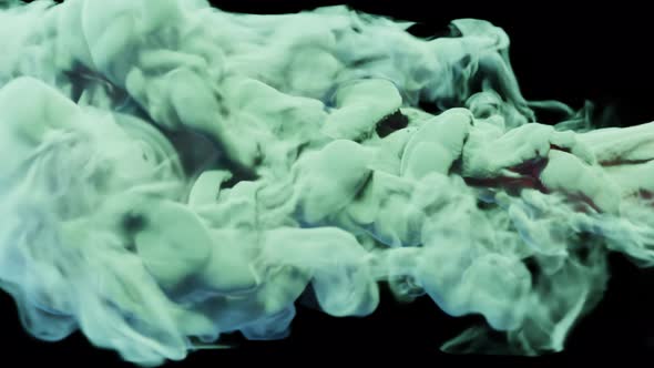 colorful smoke stream on a black studio background. smoke cloud puff alt