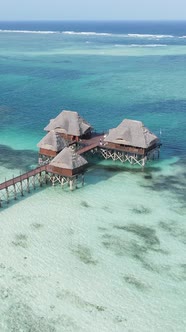 Vertical Video House on Stilts in the Ocean on the Coast of Zanzibar Tanzania