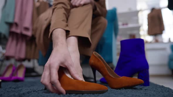 Male Foot in Highheels Closeup with Hand Stroking Elegant Stylish Shoe in Slow Motion