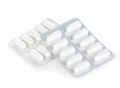 Capsule pills in blister pack close-up isolated on a white background. - PhotoDune Item for Sale