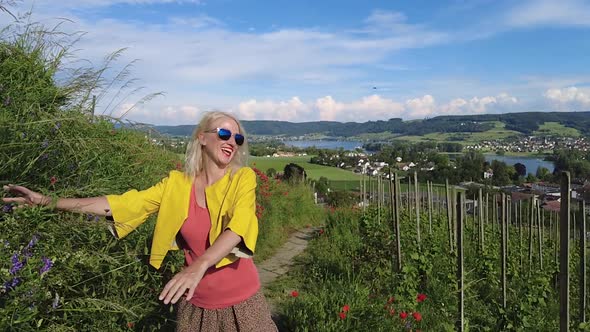 Woman Walking in Swiss Vineyards