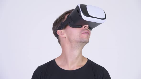 Happy Nerd Man Using Virtual Reality Headset