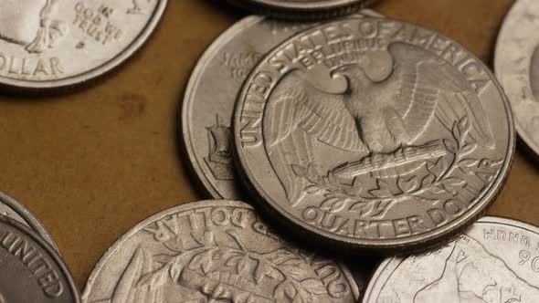 Rotating stock footage shot of American quarters (coin - $0.25) 