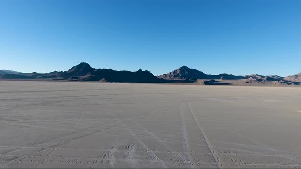 Flying over the Bonneville Salt Flats in Northwestern Utah reveal white salt and tire tracks.