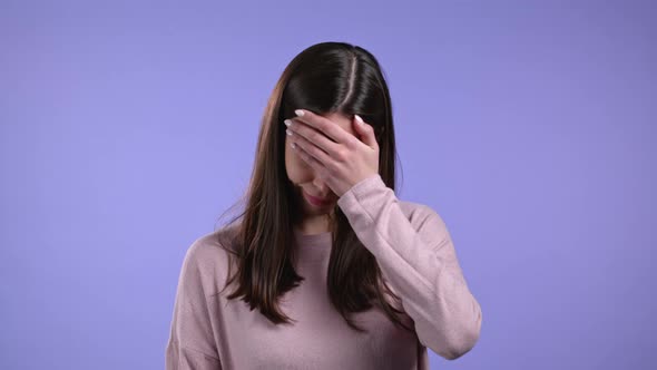 Portrait of Young Woman Doing Facepalm Gesture Like No I Forgot