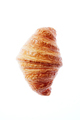 Close up french freshly baked croissant on a white background - PhotoDune Item for Sale