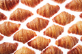 Pattern from freshly baked croissants on a white background - PhotoDune Item for Sale