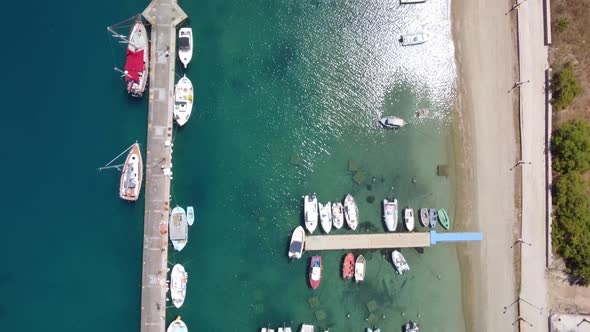 Top down aerial yachts at port. Nobody nature seascape. Ships, boats at ocean bay. Water transport