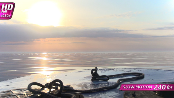 Boat Goes Out To Sea At Sunrise alt