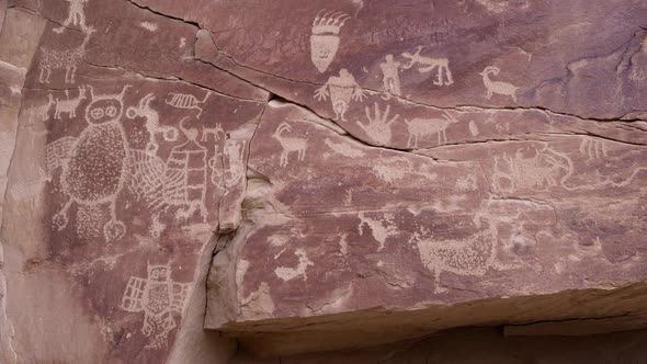 Panning across petroglyph panning in Nine Mile Canyon with Owl