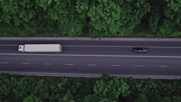 Aerial View Above Road in Forest