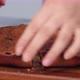Woman Slices Brownies - VideoHive Item for Sale
