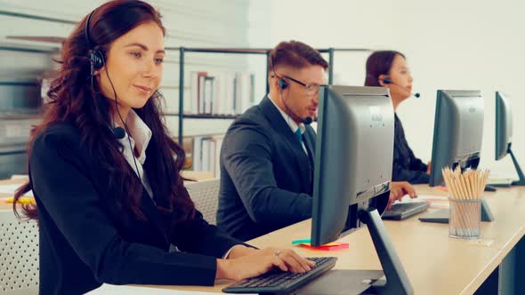 Business People Wearing Headset Working in Office