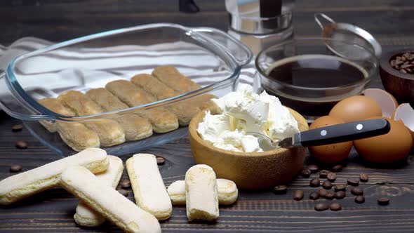 Ingredients for Making Traditional Italian Cake Tiramisu on Wooden Table