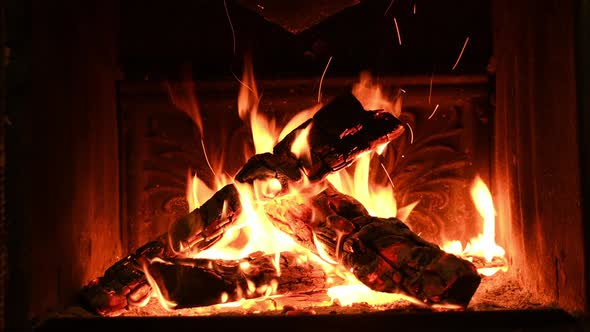 Warm Cozy Burning Fire in a Brick Fireplace Closeup Shot