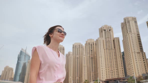 A Girl Walks on in the Dubai Marina Area