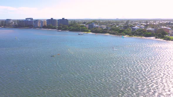 Aerial view of kitesurfing on a hydrofoil board, Queensland, Australia.