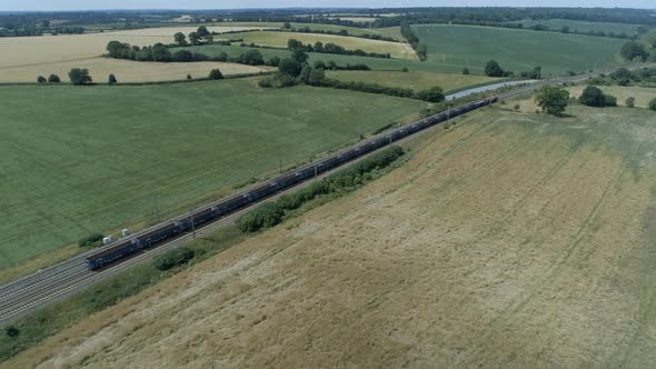 Freight Train Travelling Through The Countryside