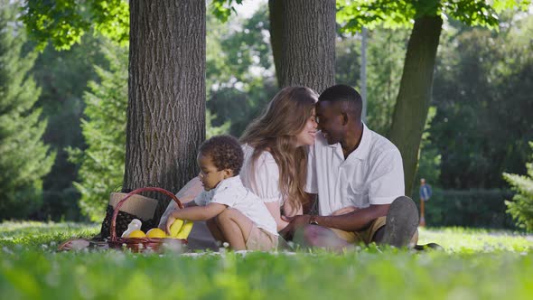 A Cute Multicultural Family Had a Picnic in the Park