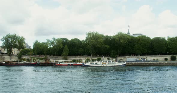 Steamboats are Moored at a Pier on the Seine River in Paris