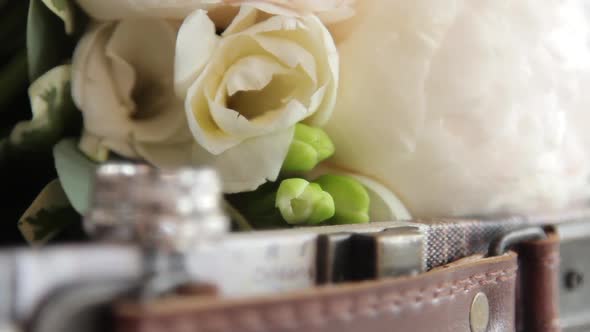 Wedding Rings with Diamonds Near Flowers, Dynamic Change of Focus