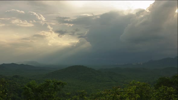 Rain storms and black clouds moving over the mountains.