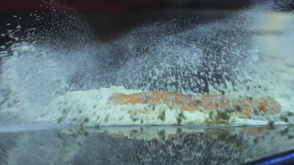 Falling Chicken Meat In Flour On Table alt