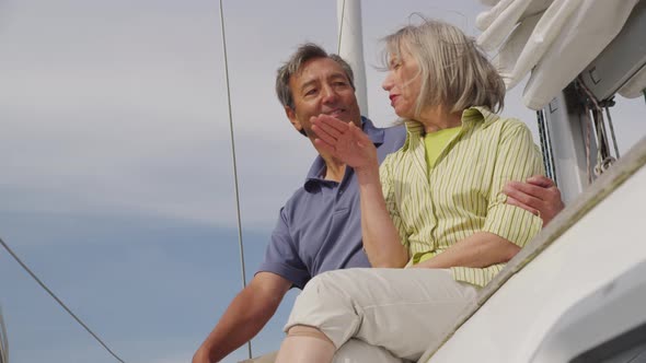 Senior couple on sailboat together. Shot on RED EPIC for high quality 4K, UHD, Ultra HD resolution.