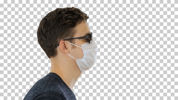 Blind man walking in medical mask and dark glasses, Alpha Channel