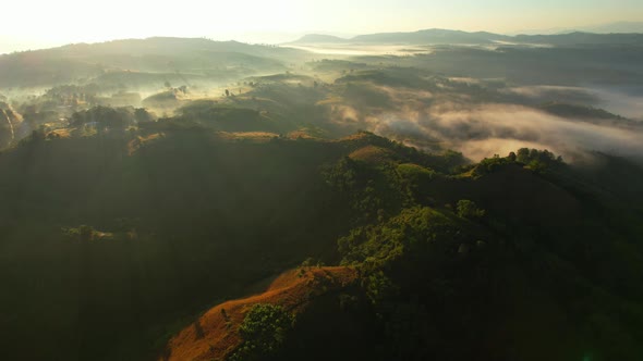 4K Aerial view of Mountains landscape with morning fog.