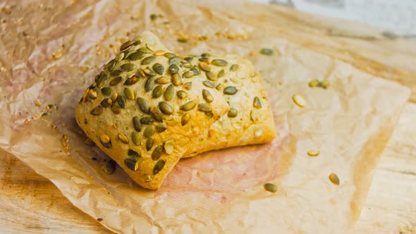 Two Freshly Baked Square Loaves of Bread with Pumpkin Seeds