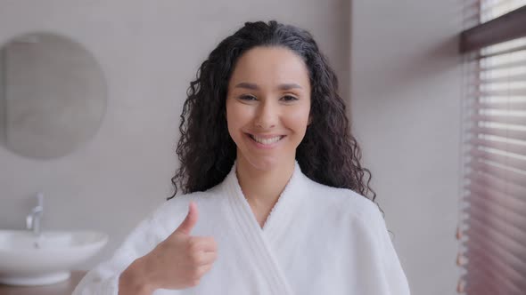 Female Portrait Young Happy Hispanic Woman Client Standing in Bathroom or Beauty Parlor Smiling