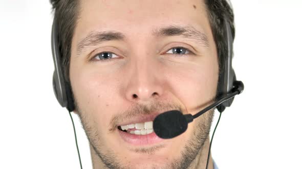 Face Close Up of Talking Call Center Agent on White Background