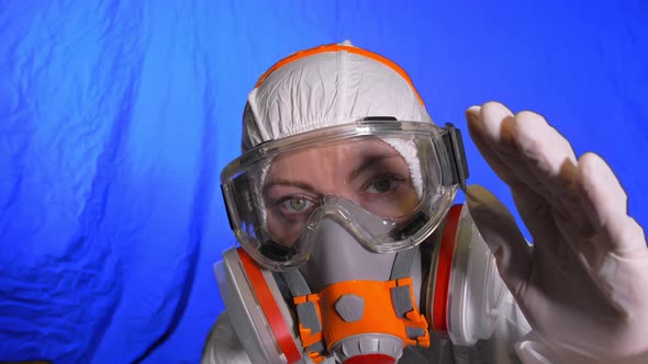 Scientist Virologist in Respirator. Woman Close Up Look, Wearing Protective Medical Mask. Concept