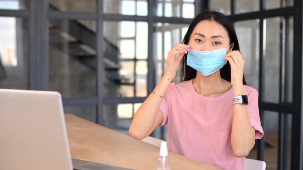 An Young Asian Woman Wearing Medical Mask Indoor