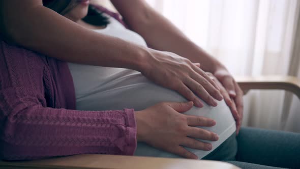 Pregnant Couple Feels Love and Relax at Home