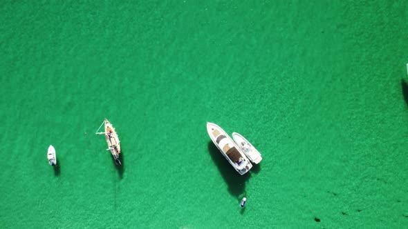 Aerial Panoramic View of Seascape with Crystal Clear Azure Sea and Rocky Shores