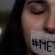 Portrait of a woman with a sticker on her mouth that says "#metoo". Me Too movement. - VideoHive Item for Sale