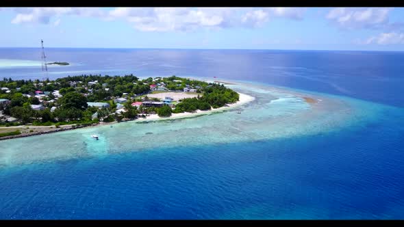 Aerial above landscape of marine coastline beach journey by clear ocean and white sand background of