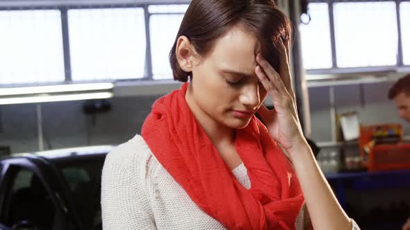 Woman standing in tensed mood