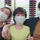happiness asian dad mom son wearing face mask sit relax smile together - VideoHive Item for Sale