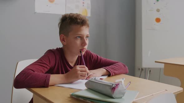 13-Year-Old Boy in Class