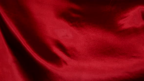 Red Wavy Fabric Background in Super Slow Motion, 