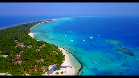 Aerial drone shot texture of tranquil island beach vacation by turquoise ocean and white sandy backg