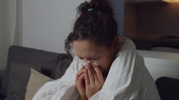 Sick Adult Woman Coughing Sneezing Blowing and Wiping Nose Indoors