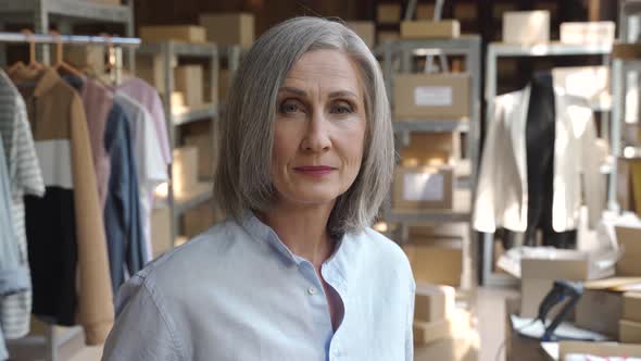 Woman Dropshipping Clothing Business Owner in Warehouse Headshot Portrait