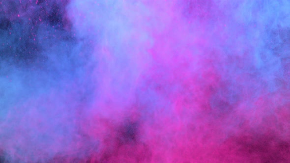 Super Slowmotion Shot of Color Powder and Smoke Background