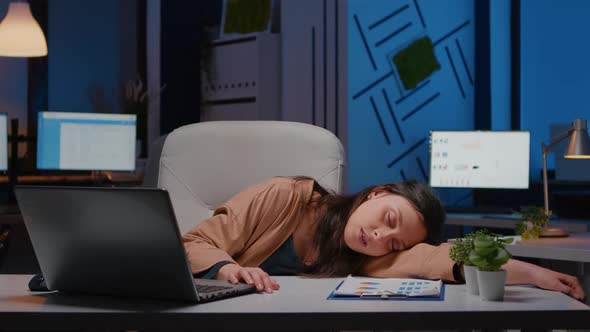 Businesswoman Sleeping While Working at Accounting Statistics in Company Office