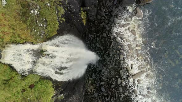 Top View of the Waterfall Near Neist Point and Rocky Shore in Skye