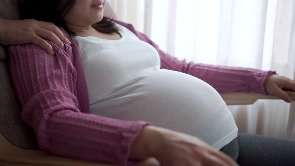 Pregnant Couple Feels Love and Relax at Home